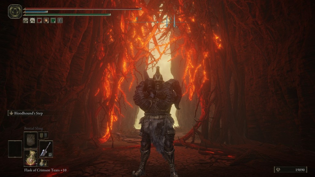 Heavy armor warrior facing a glowing root tunnel in Elden Ring’s Shadow of the Erdtree DLC, with Bloodhound’s Step equipped