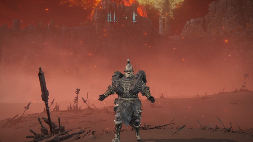 Player character in heavy armor build standing in a fiery battlefield from Elden Ring’s Shadow of the Erdtree DLC