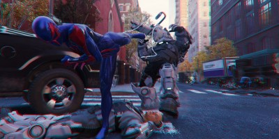 Spider-Man 2099 Black Suit performing a high kick on an armored enemy in Marvel’s Spider-Man Remastered, with a defeated foe on the ground.