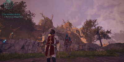 A warrior in red and gold armor stands in front of an ancient ruin in Avowed, accompanied by a blue-skinned companion, with a dramatic purple sky in the background.