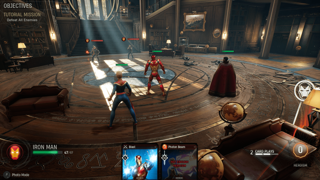In-game screenshot from Marvel’s Midnight Suns showing Iron Man, Captain Marvel, and Doctor Strange during a tactical combat tutorial mission inside the Abbey.