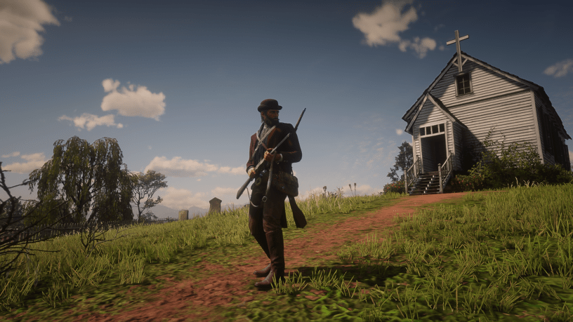 Arthur Morgan standing with a rifle outside a church in Red Dead Redemption 2