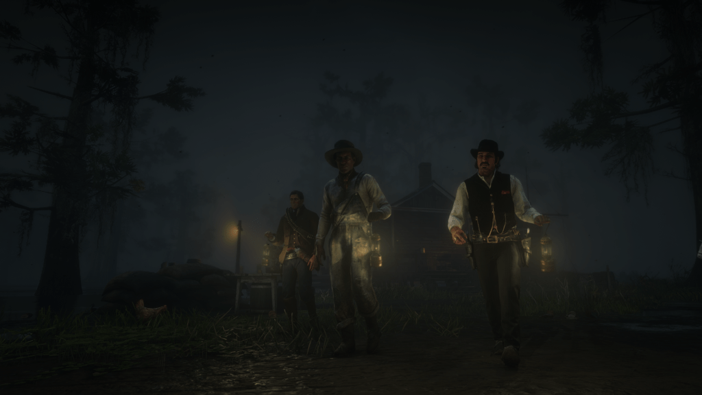 Dutch van der Linde and gang members carrying lanterns in the swamps at night in Red Dead Redemption 2
